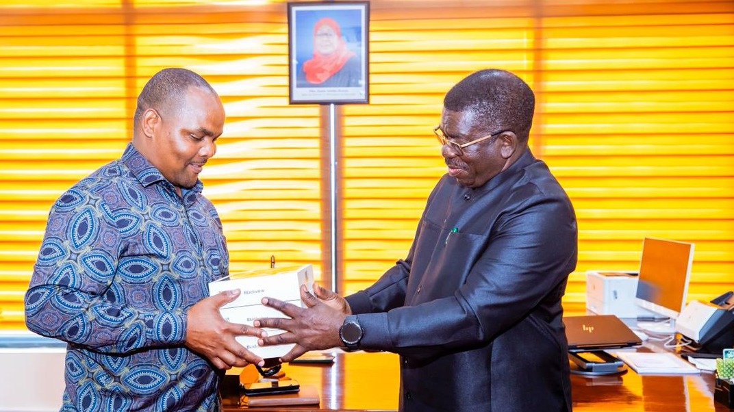 Naibu Waziri Mhe. Dkt. Switbert Zacharia Mkama (Mb.),  amekabidhi vishikwambi 101 kwa Mkurugenzi Mte...